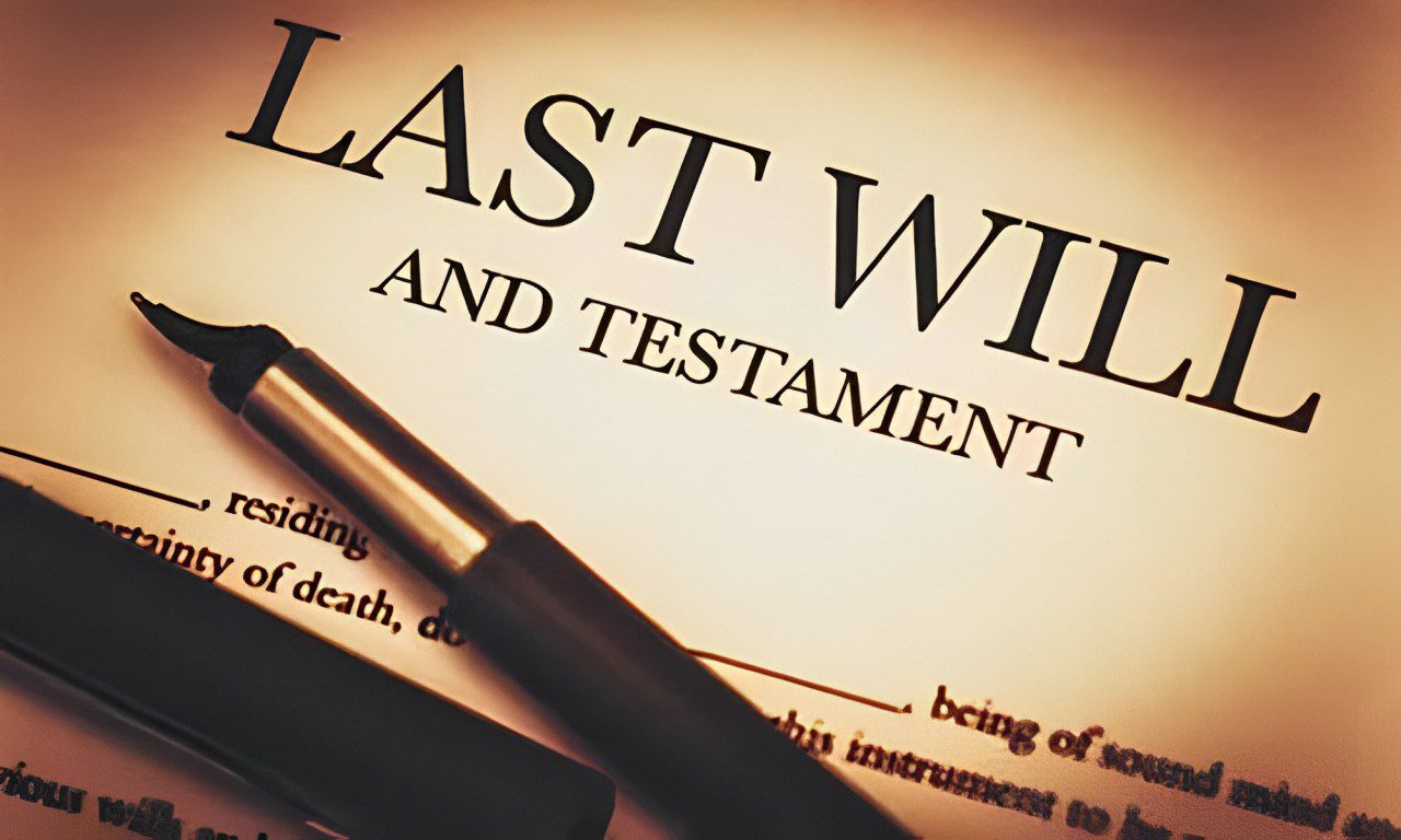 A last will and testament with pens on top of it.